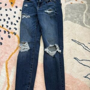 Distressed Blue Jeans